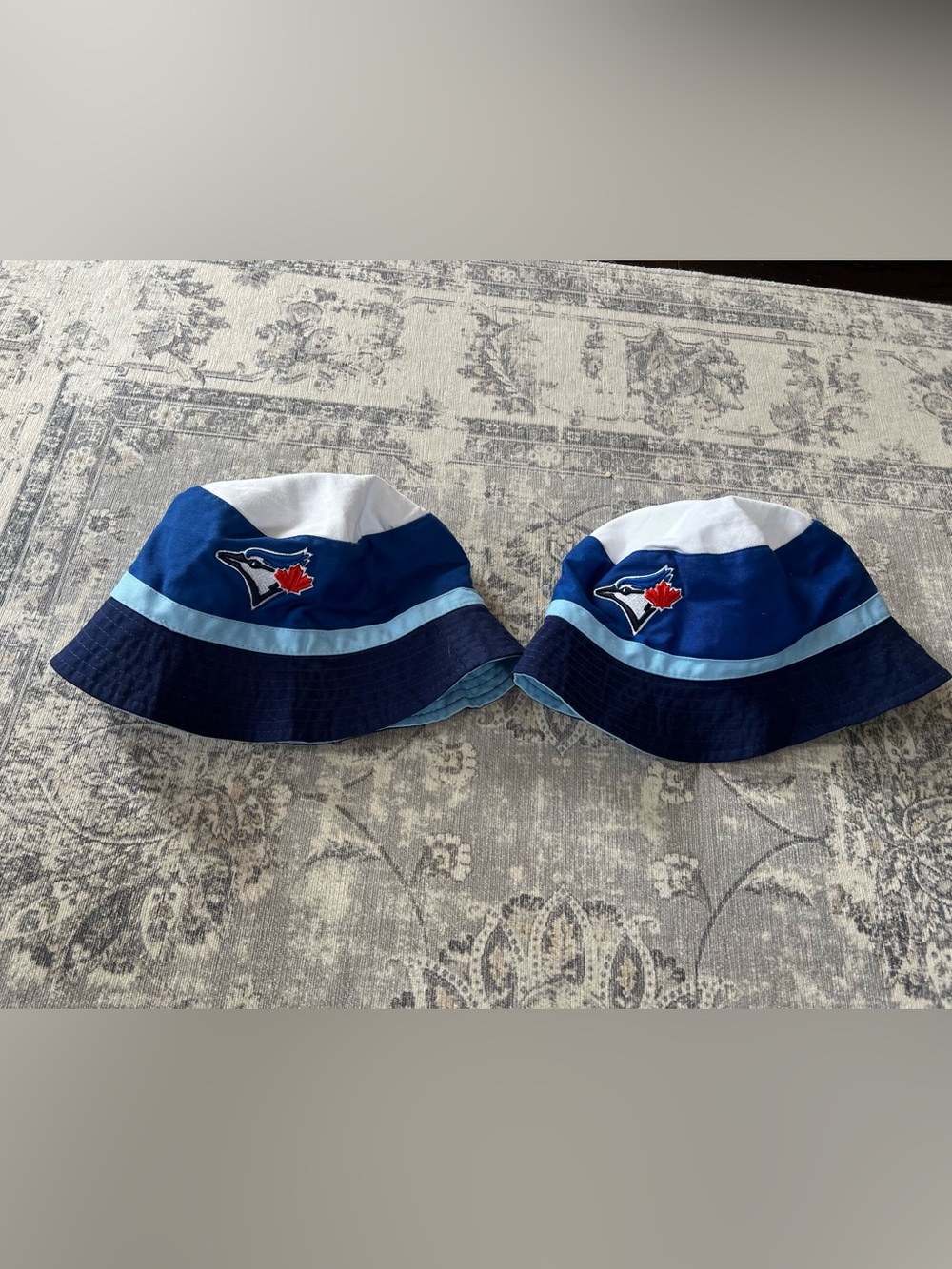 Two Toronto blue jays bucket hats